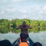 Tourist on a canoe at Nzolezo